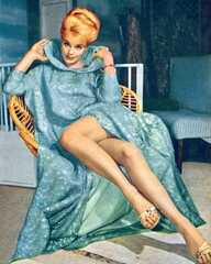 Elke sommer Weraing Pink Fleece/ Sitting on Red Cushion Photo (Elke Sommer)