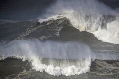 Mad Dog' surfer dies riding giant waves in Nazaré, Portugal | CNN