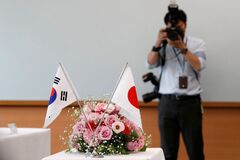 Japan and South Korea agree to mend ties as leaders meet following ...