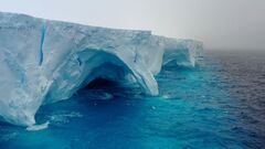 A23a iceberg seen with striking arches and cavernous hollows as it ...