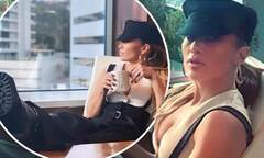 Jennifer Lopez exudes boss vibes as she kicks her feet up in ...