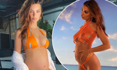 Emily Ratajkowski displays her blossoming baby bump in orange ...