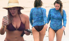 Hilary Duff puts her sculpted physique on display in a bikini ...