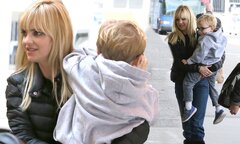 Anna Faris cuddles up to sweet son Jack at LAX | Daily Mail Online