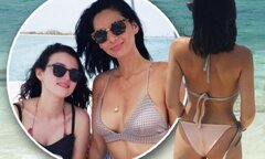 Bikini-clad Olivia Munn flashes pert behind | Daily Mail Online