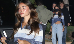 Madison Beer flashes her washboard abs in a blue cropped jumper as ...