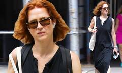 Ellie Kemper runs errands in a chic black dress after Alone ...