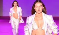 Gigi Hadid showcases her toned midriff in a bikini top with ...