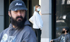 Shia LaBeouf sits on the sidewalk for his pregnant ex-wife Mia ...