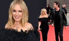 Kylie Minogue puts on a loved-up display with rarely seen ...