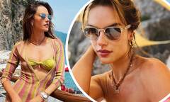 Alessandra Ambrosio dons a bright bikini coverup as she shares an ...