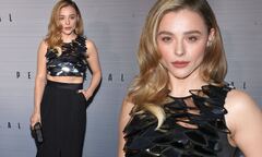 Chloe Grace Moretz bares her flat midriff in a crop top to the ...