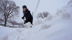 Snow, ice, wind and bitter cold pummels the northern US in ...