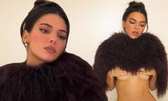 Kendall Jenner flashes a glimpse of underboob and bare taut ...