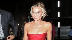 Margot Robbie changes into a leggy corseted mini dress for Barbie ...