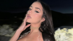 Demi Rose flashes major cleavage in shimmering pink bra as she ...