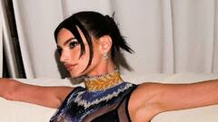 Emily Ratajkowski twerks in a daring sheer dress which shows off ...