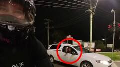 Wild moment motorcyclist cops a barrage of abuse from foul-mouthed ...