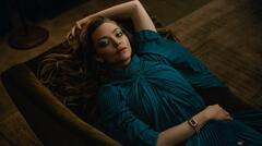 Actress and singer Amanda Seyfried looking sexy and hot in cyan ...