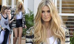 Delta Goodrem shows off a very impressive pair of pins on photo shoot