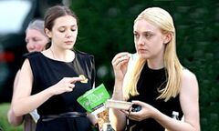 Elizabeth Olsen snacks on pretzel crisps during filming break - as ...