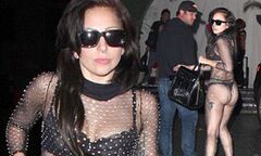 Lady Gaga wears a jewel-encrusted, sheer bodysuit over a black bra ...