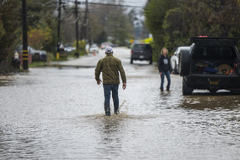 Atmospheric river floods California towns, brings rain, snow