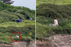 Couple caught having sex on edge of a cliff in video