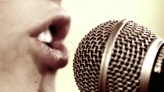 Girl singing into microphone Rack Focus | Stock Video | Pond5