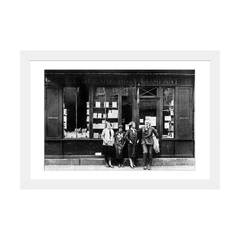 Ernest Hemingway and Sylvia Beach infront of the 'Shakespeare and Company' bookshop (Ernest Hemingway and Sylvia Beach Infront of The 'Shakespeare and Company' Bookshop, Paris, 1928 Wall,: 24 x 16)