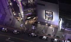 2 charged with murder in shooting death of man at LA Live ...