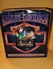 1997 harley davidson christmas ornament harley elf sleeping in saddlebag (Harley-Davidson North Pole Motorcycle Club Christmas Ornament)