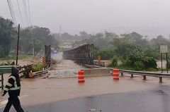 Flooding from Hurricane Fiona destroys a bridge in Puerto Rico