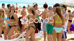 Young people enjoying the beach in Sprin... | Stock Video | Pond5