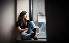 Hailee Steinfeld Sitting Near Window In Black