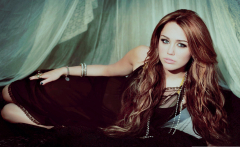Miley Cyrus in black wallpaper