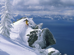 Skier Atop a Mountain